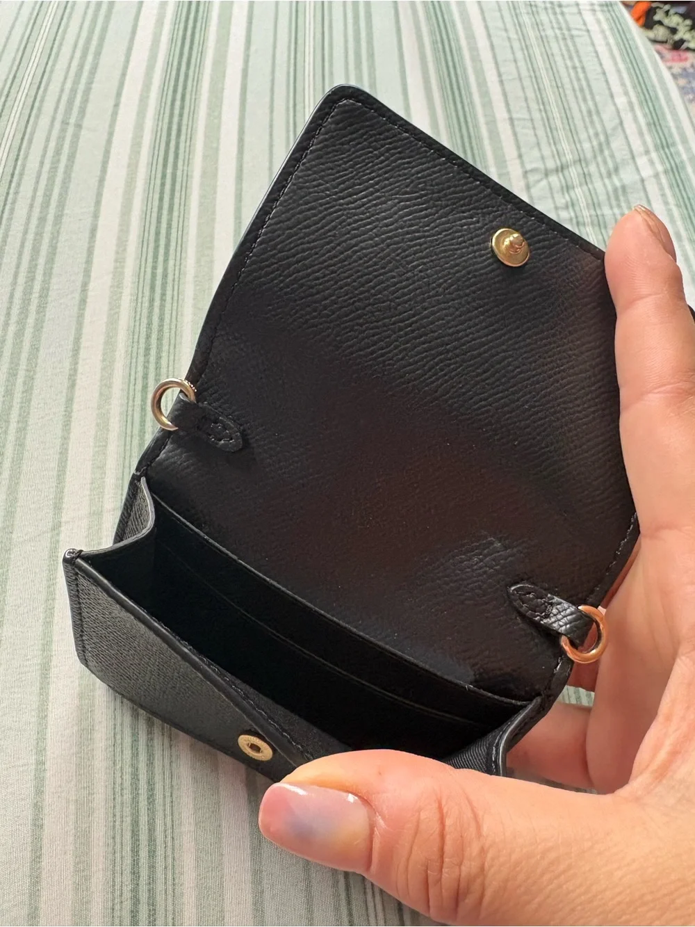 Coach Black Leather Compact Wallet with Gold Logo Accent